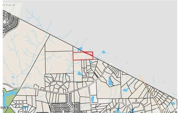 a view of a lake with a yard