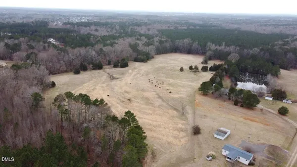 a view of a backyard of a house