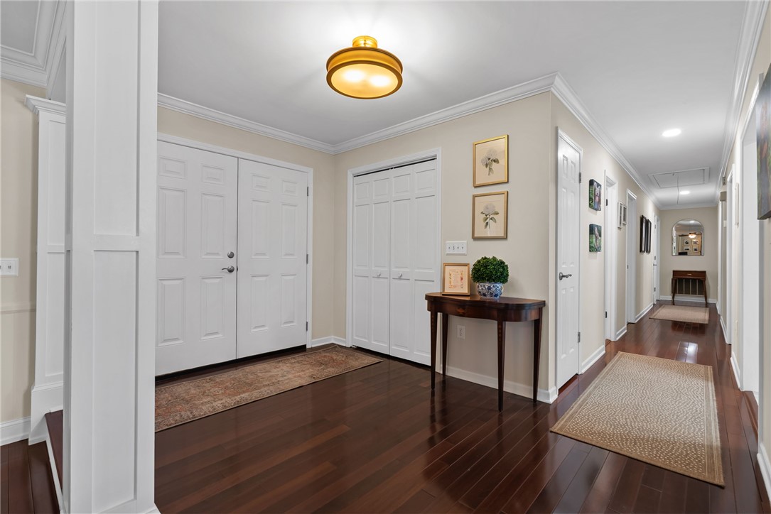 3513 Hopewell Road Anderson, SC 29621 - Photo 18 of 50 Enter into a welcoming foyer boasting rich wood flooring and elegant crown molding.