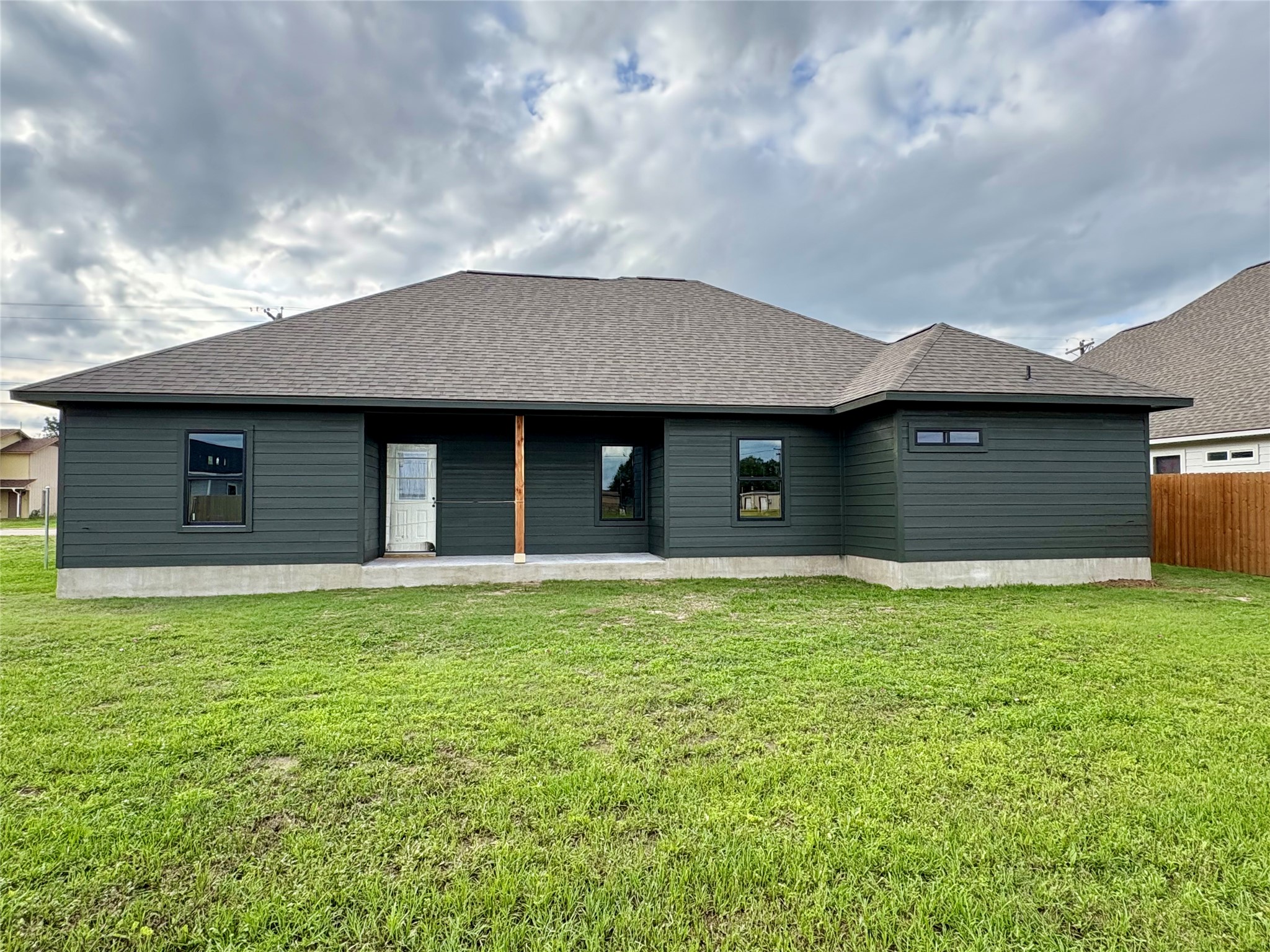 330 Cactus Street Giddings, TX 78942 - Photo 4 of 7 a house with a yard