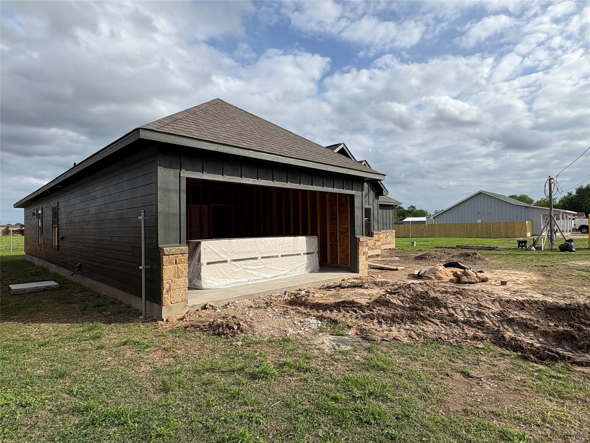 330 Cactus Street Giddings, TX 78942 - Photo 6 of 7 a front view of a house with a yard