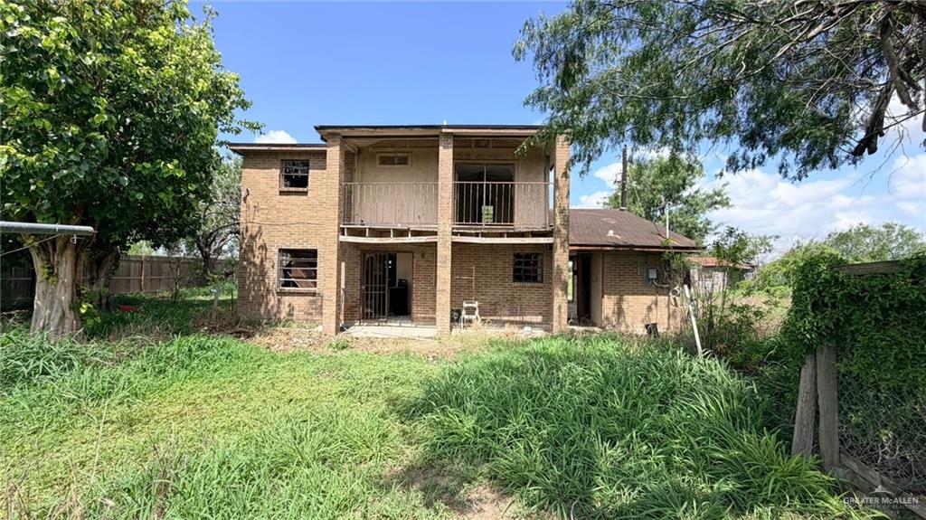 1524 West Hi Line Road Pharr, TX 78577 - Photo 33 of 34 a front view of a house with a yard