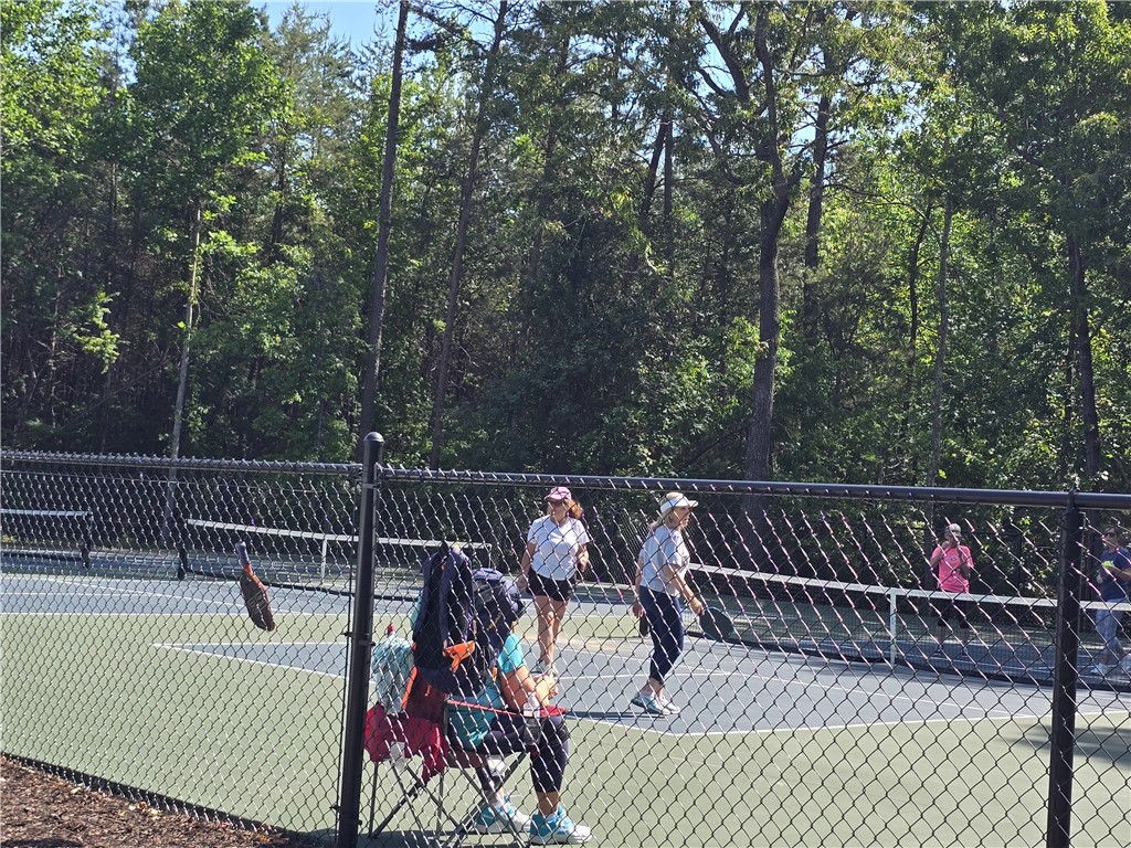 0 Turnberry Loop Seneca, SC 29678 - Photo 12 of 16 This community tennis court offers recreation amidst natural surroundings.