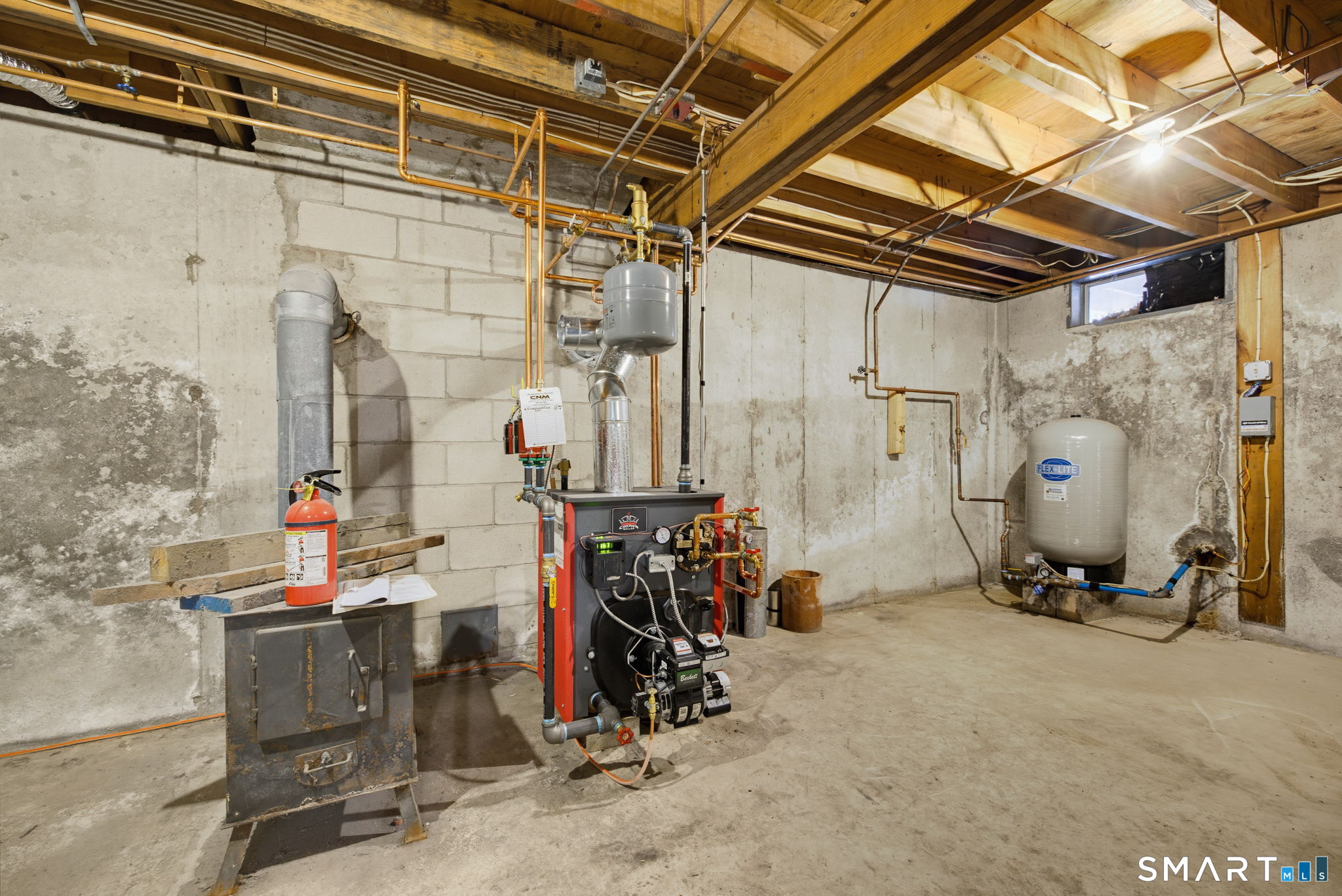 151 Fire Tower Road Eastford, CT 06242 - Photo 25 of 39 Basement with newer boiler.