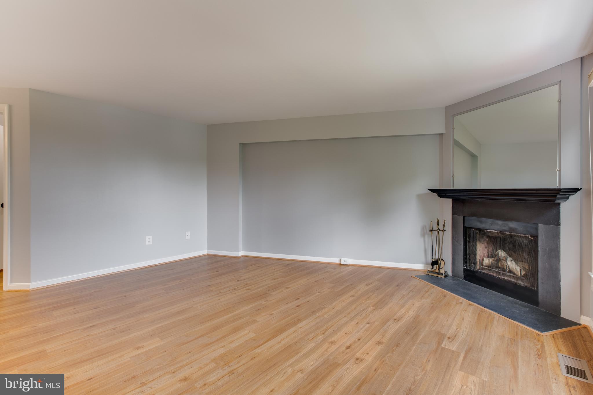 1709 Whisperhill Drive Reston, VA 20194 - Photo 21 of 41 Master suite accented walls and fireplace.