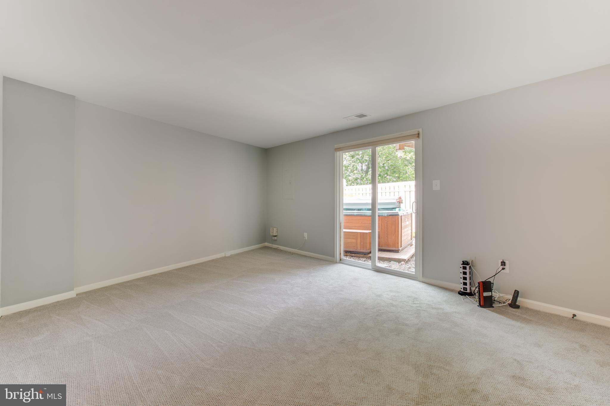 1709 Whisperhill Drive Reston, VA 20194 - Photo 26 of 41 Lower level bedroom with new vinyl doors.