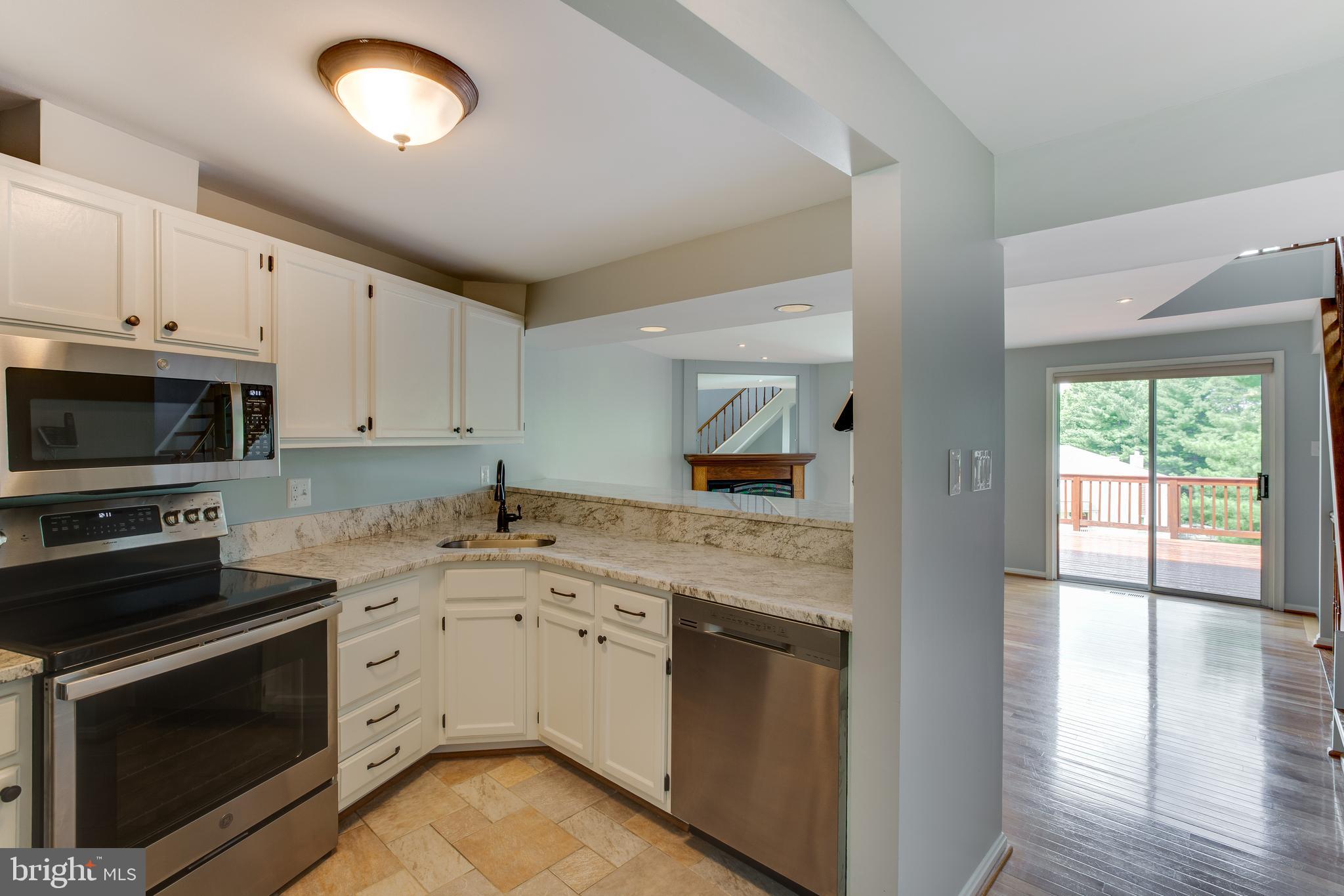 1709 Whisperhill Drive Reston, VA 20194 - Photo 4 of 41 New updated kitchen w/granite countertops.