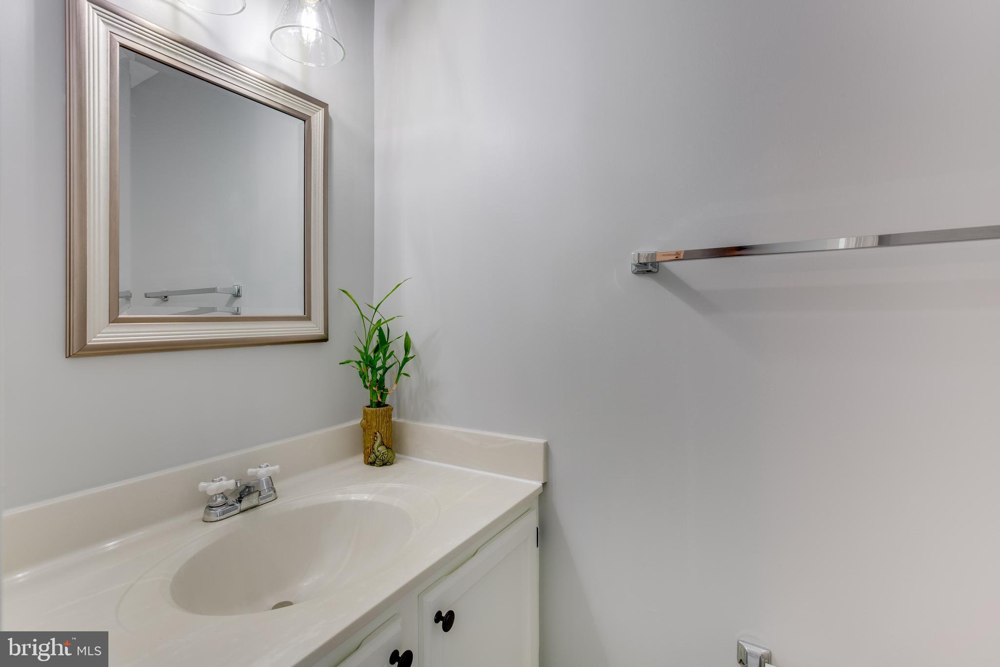 1709 Whisperhill Drive Reston, VA 20194 - Photo 7 of 41 Tastefully updated powder room.