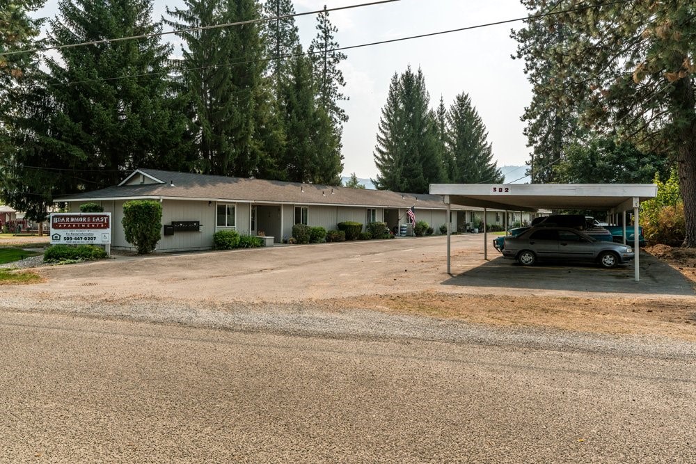 303 Harriet Street Priest River, ID 83856 - Photo 4 of 9 a view of house with outdoor seating and city view
