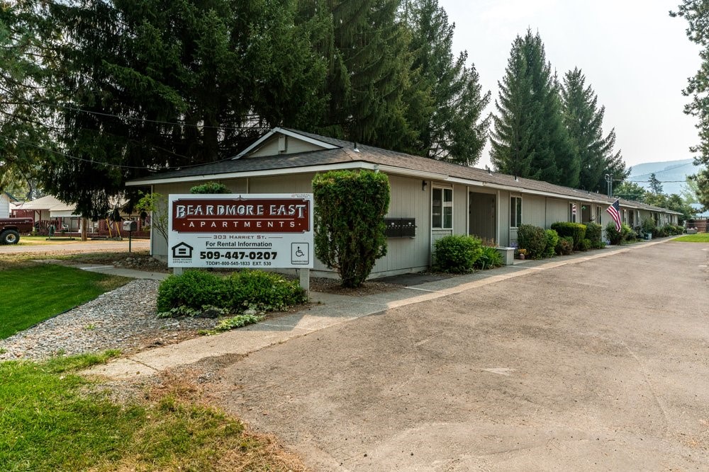 303 Harriet Street Priest River, ID 83856 - Photo 8 of 9 a view of sign board with yard and green space