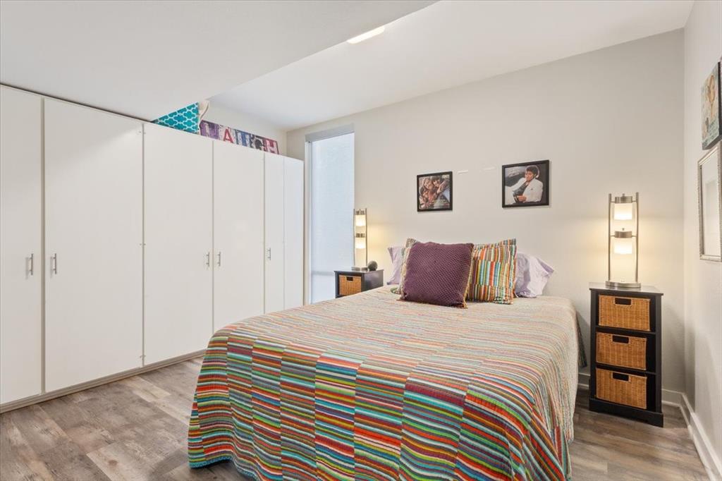 1617 Rambler Drive Waco, TX 76710 - Photo 21 of 36 Bedroom featuring light wood-style flooring and a closet