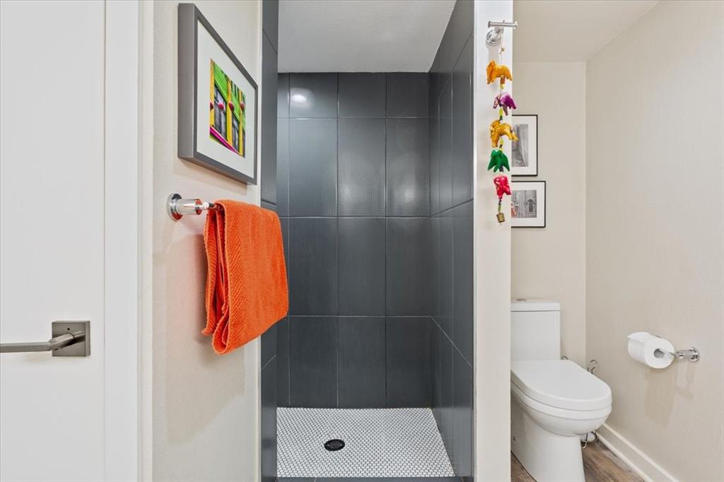 1617 Rambler Drive Waco, TX 76710 - Photo 24 of 36 Bathroom with toilet and a shower stall