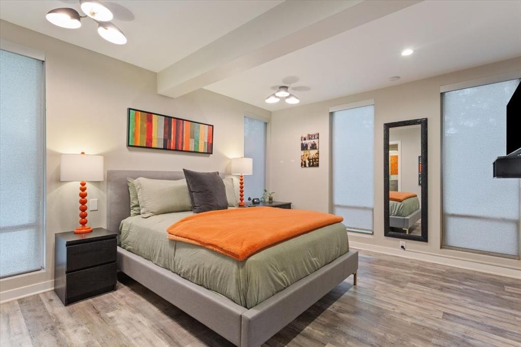 1617 Rambler Drive Waco, TX 76710 - Photo 25 of 36 Bedroom featuring beam ceiling, light wood-style flooring, and ceiling fan