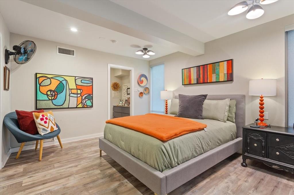 1617 Rambler Drive Waco, TX 76710 - Photo 26 of 36 Bedroom featuring light wood-style floors, ceiling fan, connected bathroom, beamed ceiling, and recessed lighting