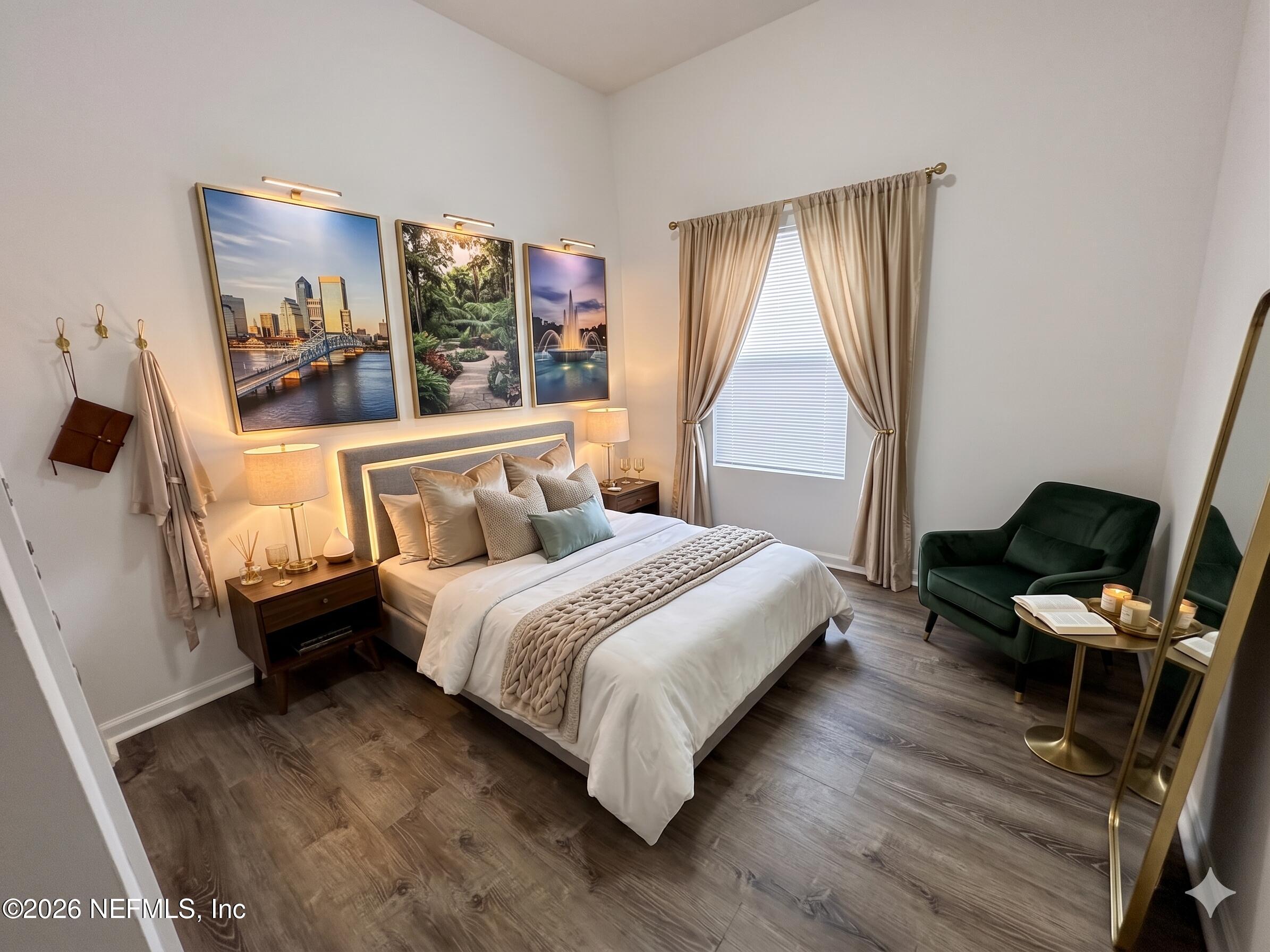 9627 Belda Way, Unit 8 Jacksonville, FL 32257 - Photo 20 of 27 a bedroom with a bed and wooden floor