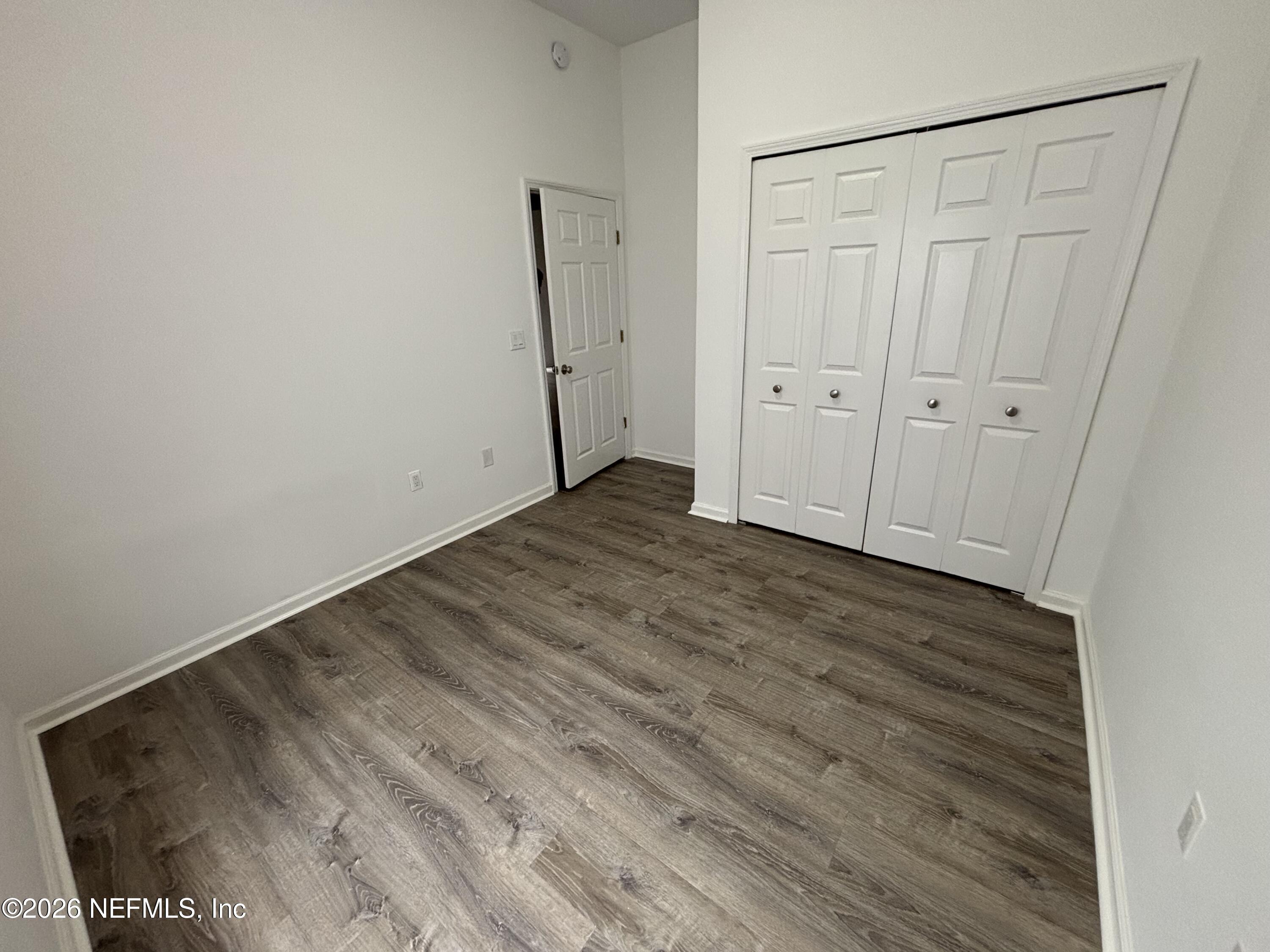 9627 Belda Way, Unit 8 Jacksonville, FL 32257 - Photo 22 of 27 a view of an empty room