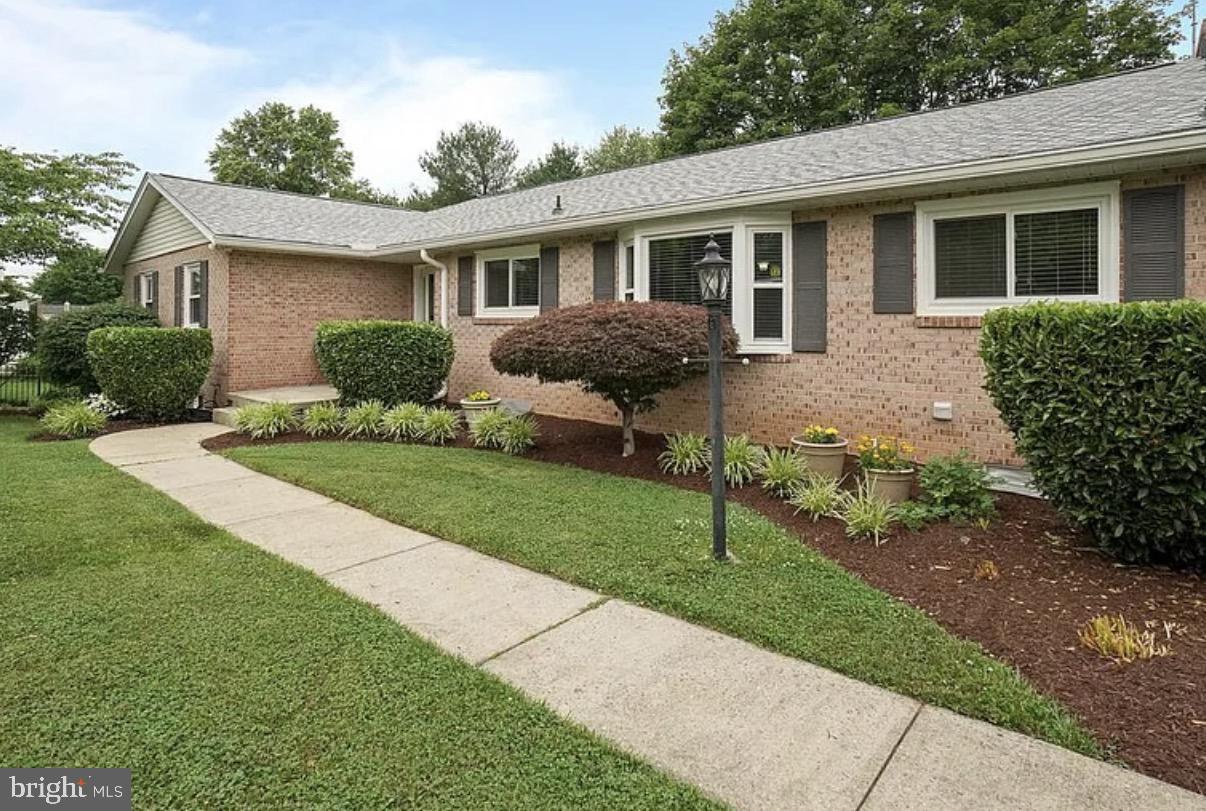 8208 Ridgelea Court Frederick, MD 21702 - Photo 1 of 2 a front view of house with yard and green space
