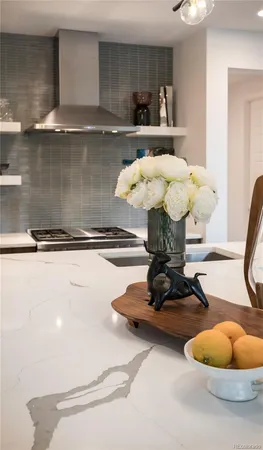 a vase of flowers sitting on a table