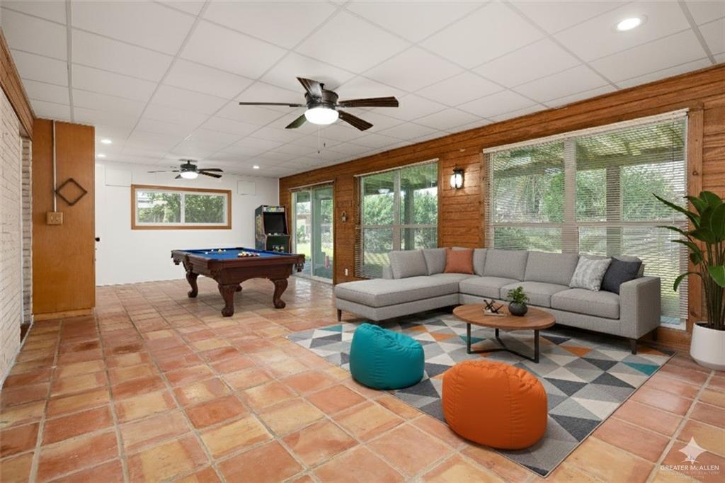 1001 West 7th Street Weslaco, TX 78596 - Photo 16 of 24 a living room with furniture and a large window