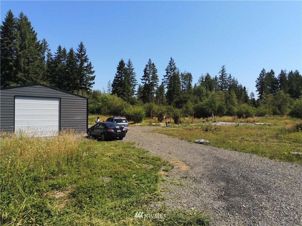 768 Logan Hill Road Chehalis, WA 98532 - Photo 27 of 35 a view of backyard with parked car