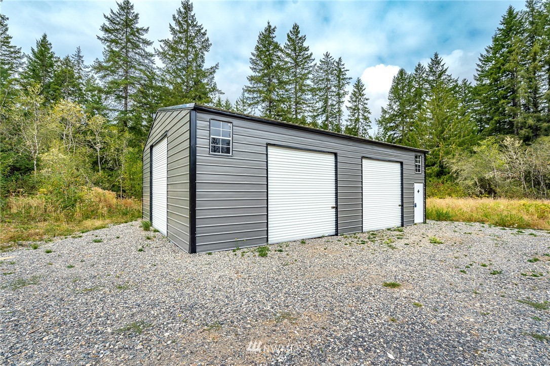 768 Logan Hill Road Chehalis, WA 98532 - Photo 29 of 35 a view of a house with a yard and garage