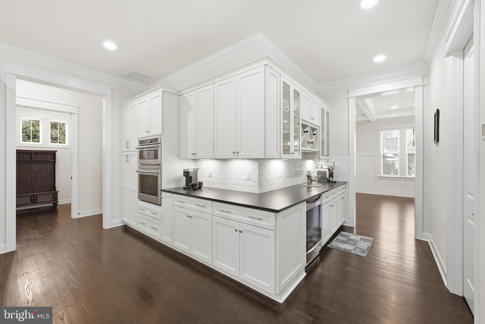 2867 Hill Road Vienna, VA 22181 - Photo 13 of 70 a kitchen with stainless steel appliances granite countertop a stove and a refrigerator