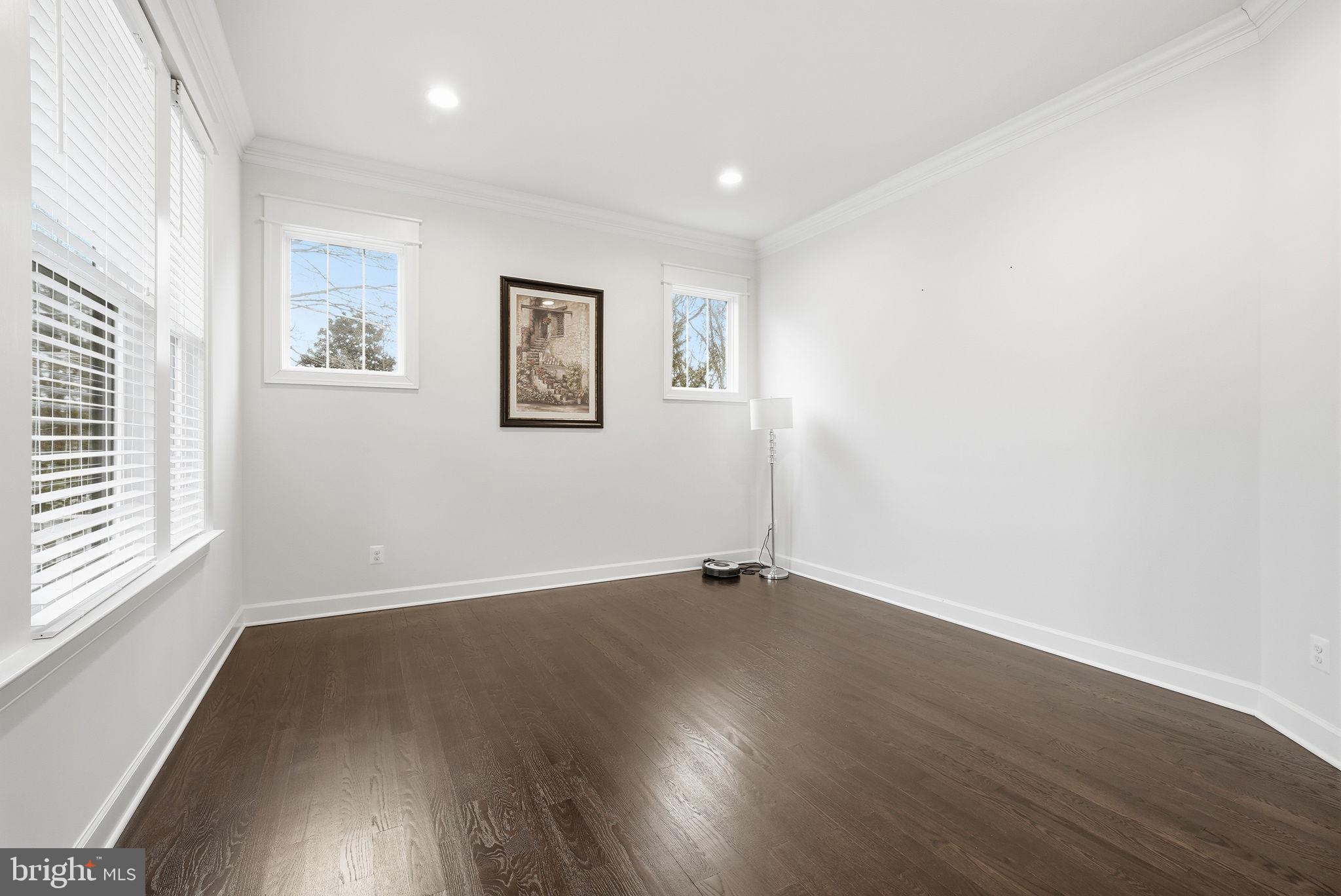2867 Hill Road Vienna, VA 22181 - Photo 25 of 70 an empty room with wooden floor and windows