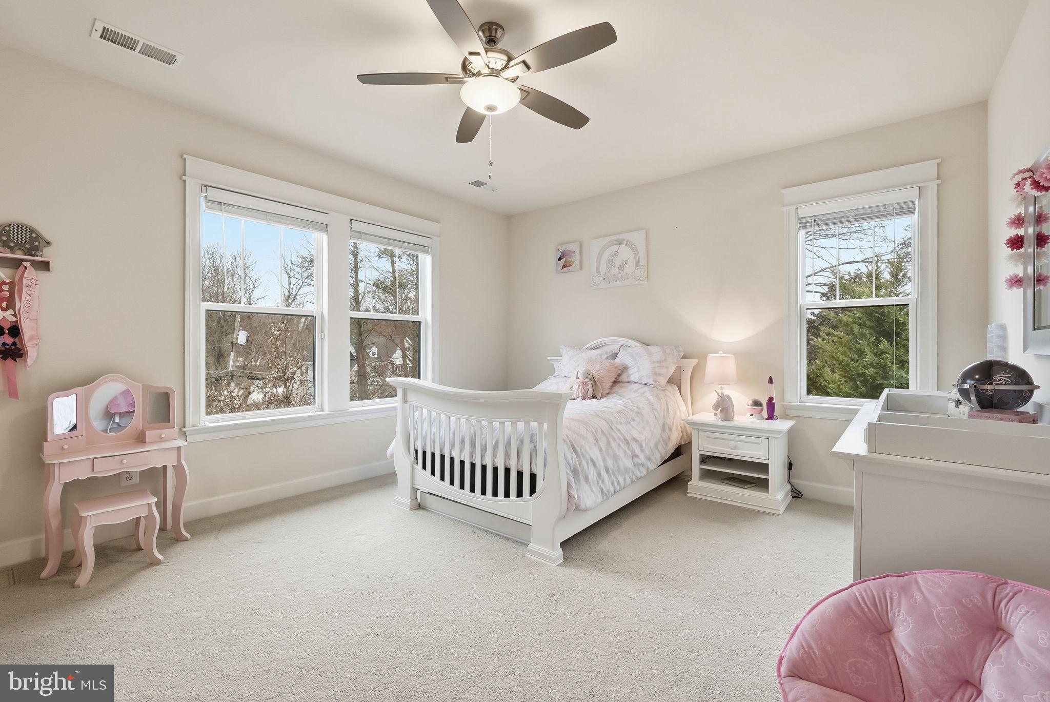 2867 Hill Road Vienna, VA 22181 - Photo 33 of 70 a bedroom with furniture and a large window