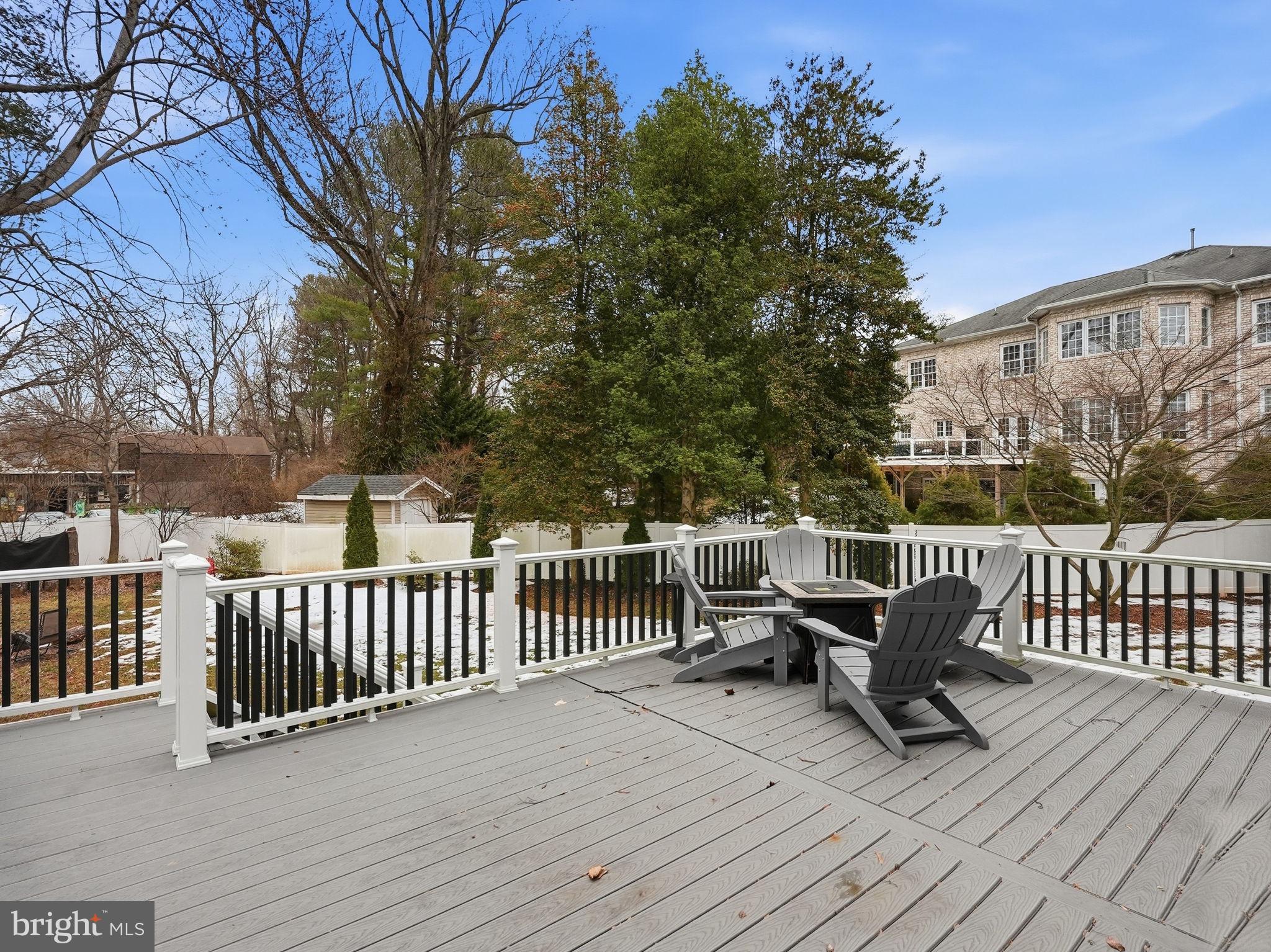 2867 Hill Road Vienna, VA 22181 - Photo 70 of 70 a view of a deck with chairs and wooden fence