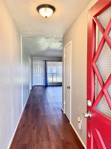 a view of fireplace and wooden floor