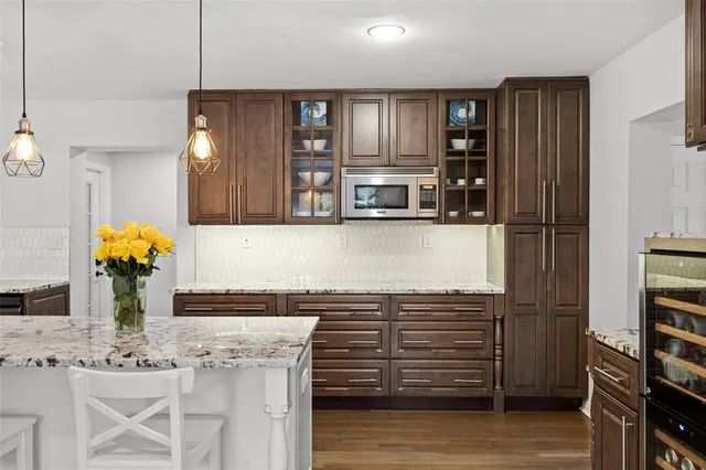 a view of a swimming pool with a yard