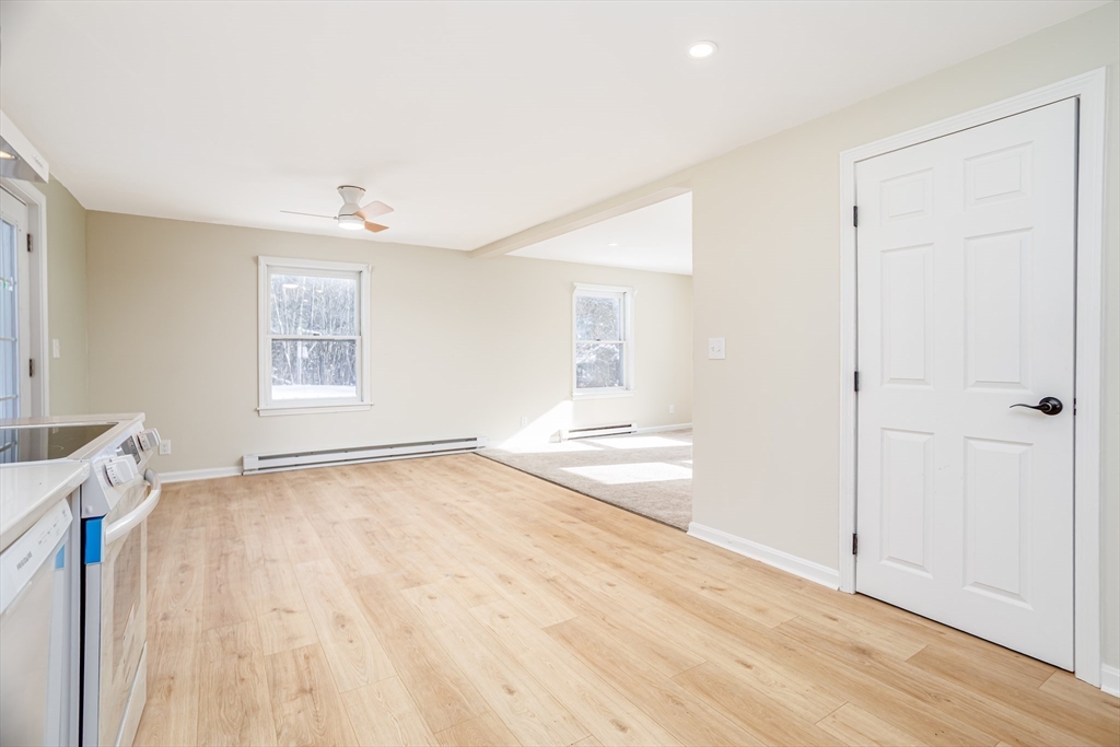 66 Minott Road Westminster, MA 01473 - Photo 12 of 41 a view of an empty room with wooden floor and a window