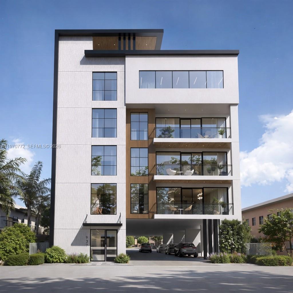 a front view of a building with a lot of windows