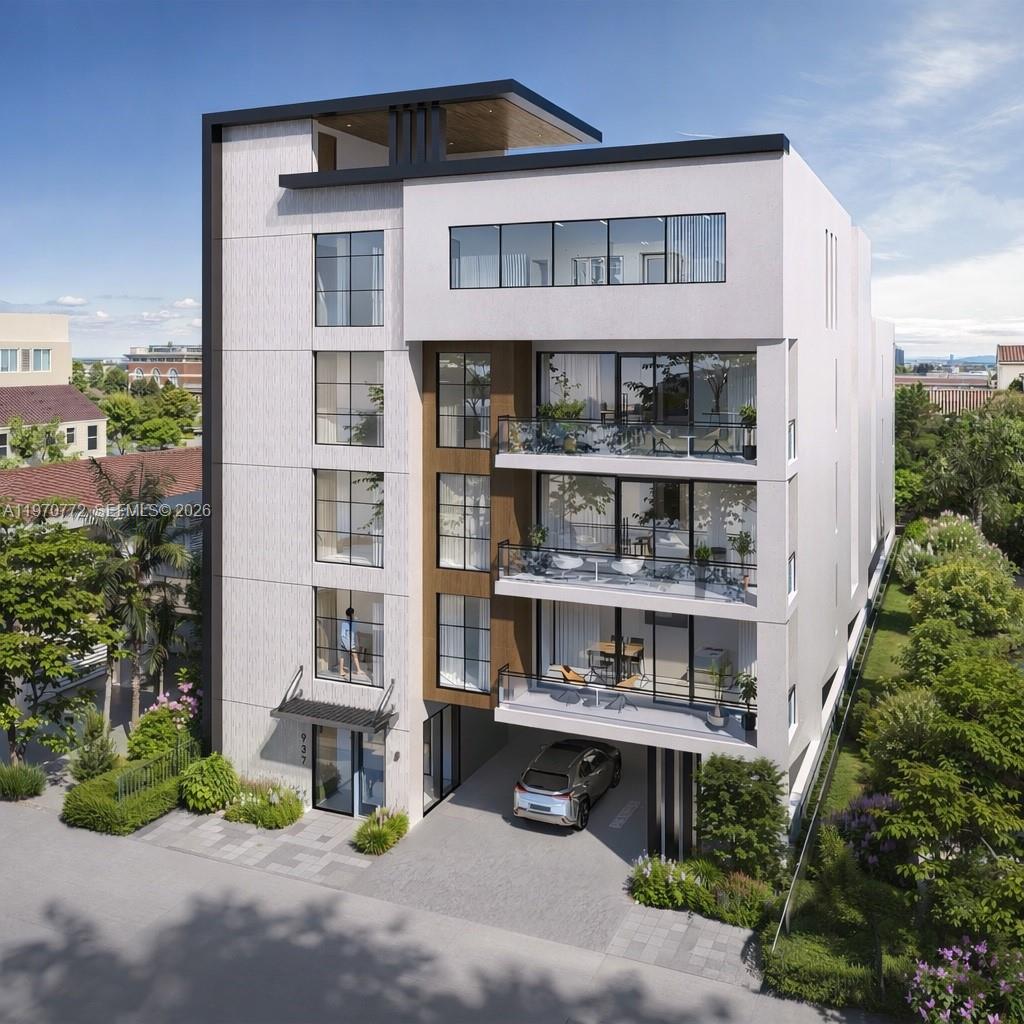 937 Southwest 7th Street Miami, FL 33130 - Photo 2 of 9 a view of a house with large windows and plants
