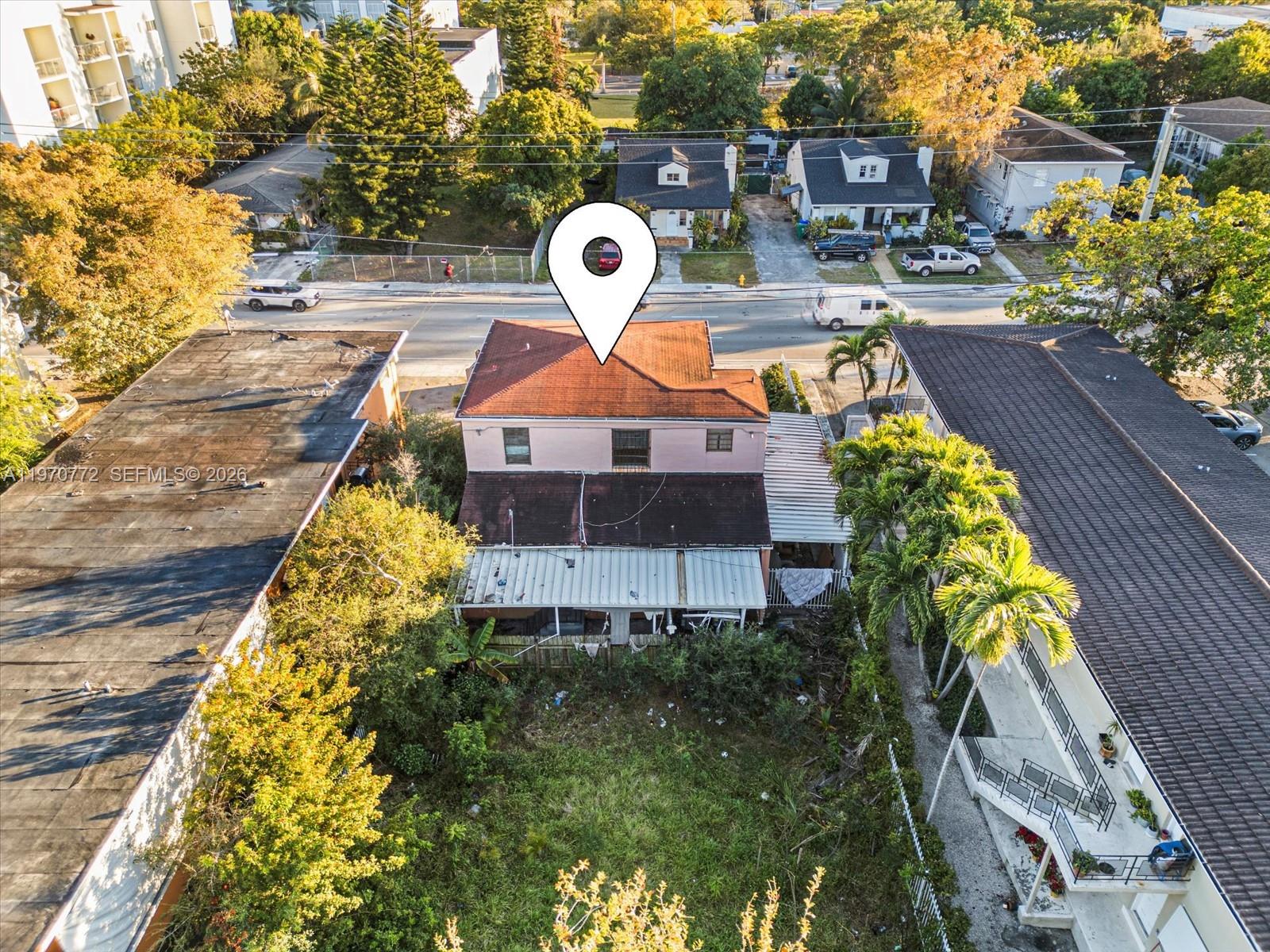 937 Southwest 7th Street Miami, FL 33130 - Photo 5 of 9 a view of a swimming pool with a patio and plants