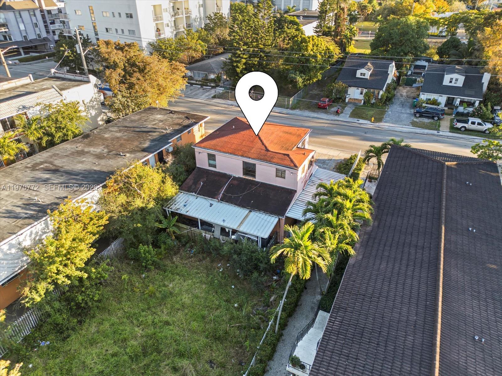 937 Southwest 7th Street Miami, FL 33130 - Photo 6 of 9 a vase of flowers sitting on a table