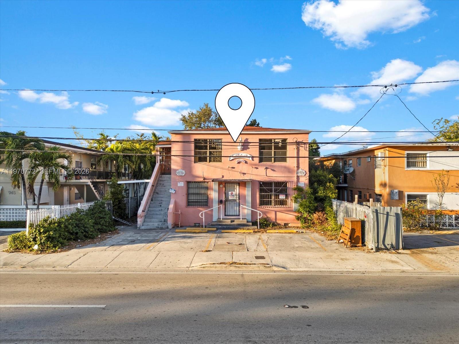937 Southwest 7th Street Miami, FL 33130 - Photo 8 of 9 a front view of a building with glass windows