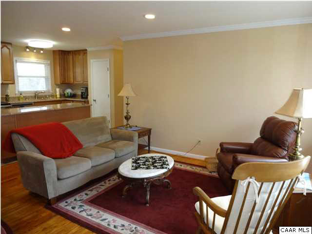 233 Hartmans Mill Road Charlottesville, VA 22902 - Photo 3 of 13 a living room with furniture and wooden floor