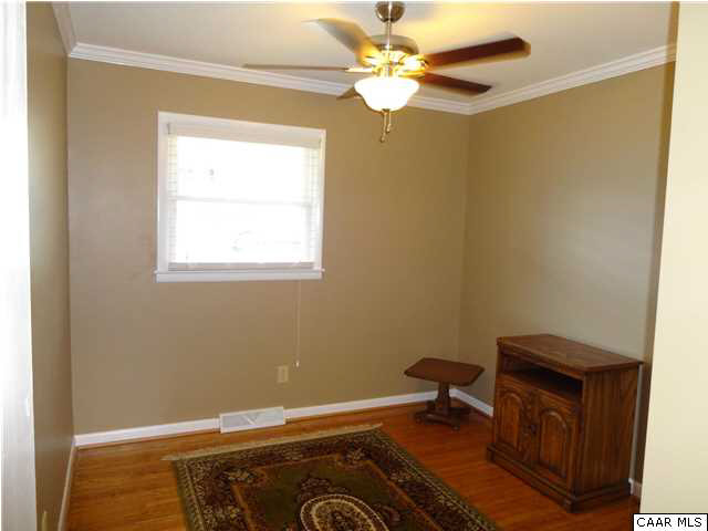 233 Hartmans Mill Road Charlottesville, VA 22902 - Photo 8 of 13 a view of a workspace with furniture and a window