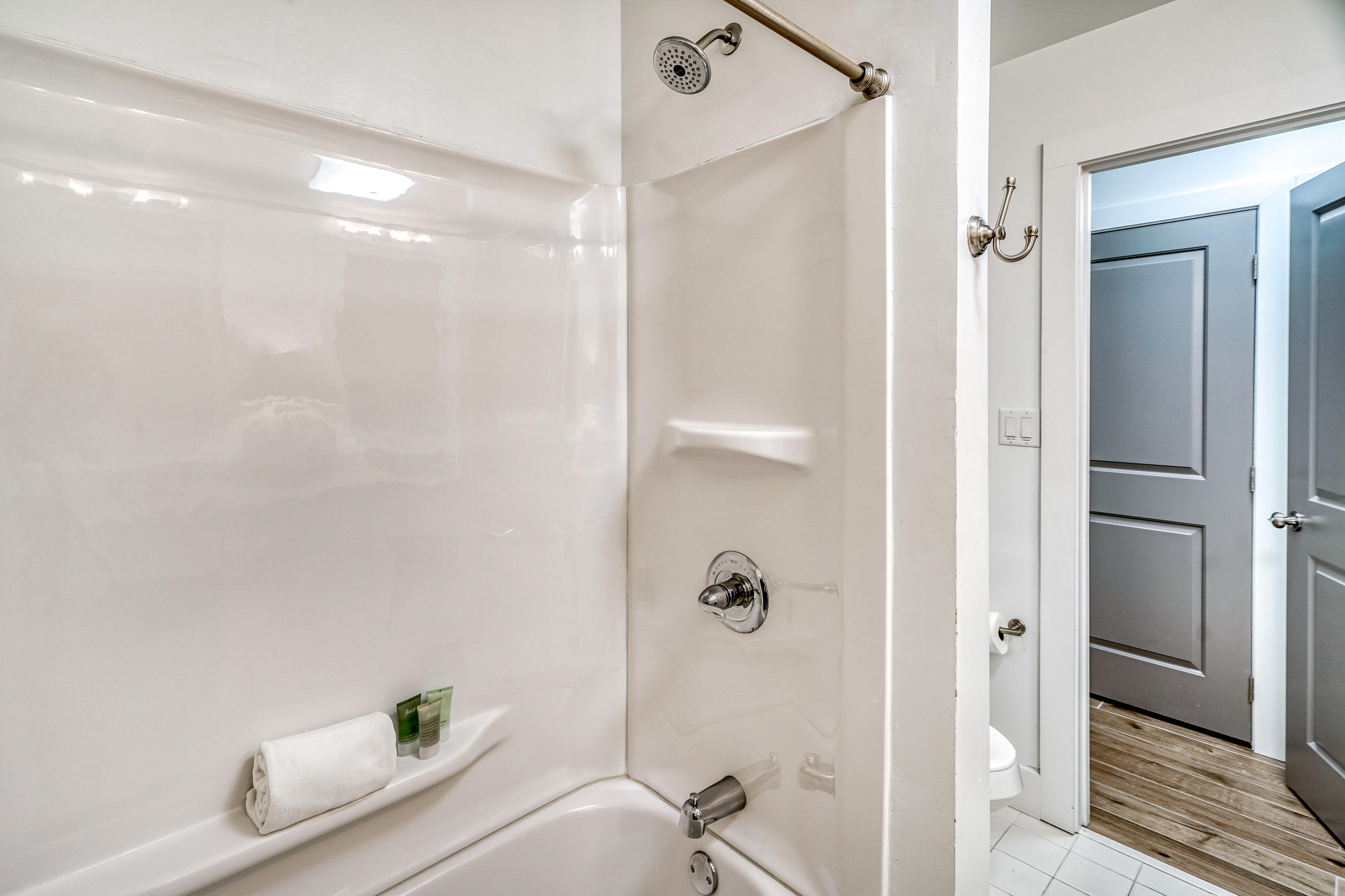 2912 East County Highway 30A Santa Rosa Beach, FL 32459 - Photo 22 of 43 a bathroom with a bathtub and shower