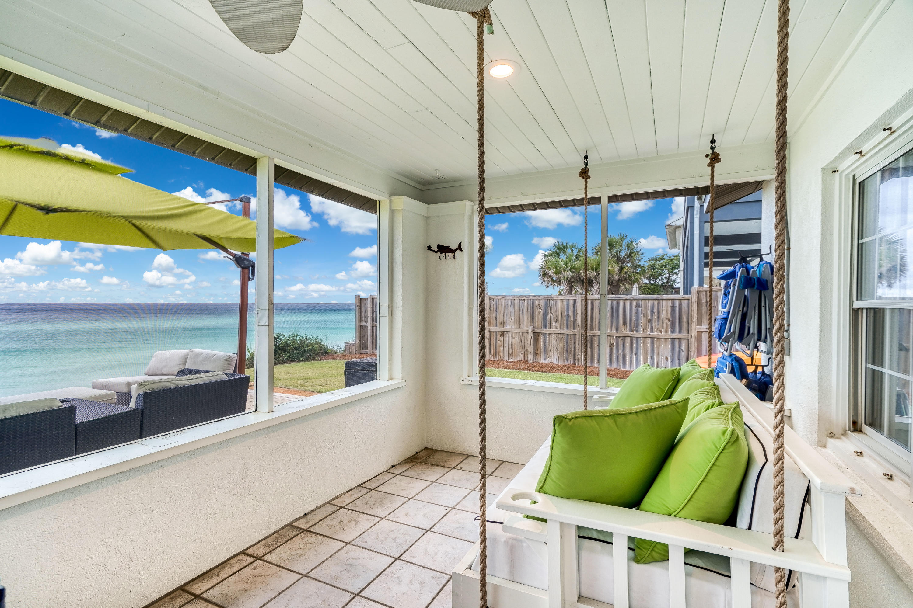 2912 East County Highway 30A Santa Rosa Beach, FL 32459 - Photo 23 of 43 a room with furniture and a window
