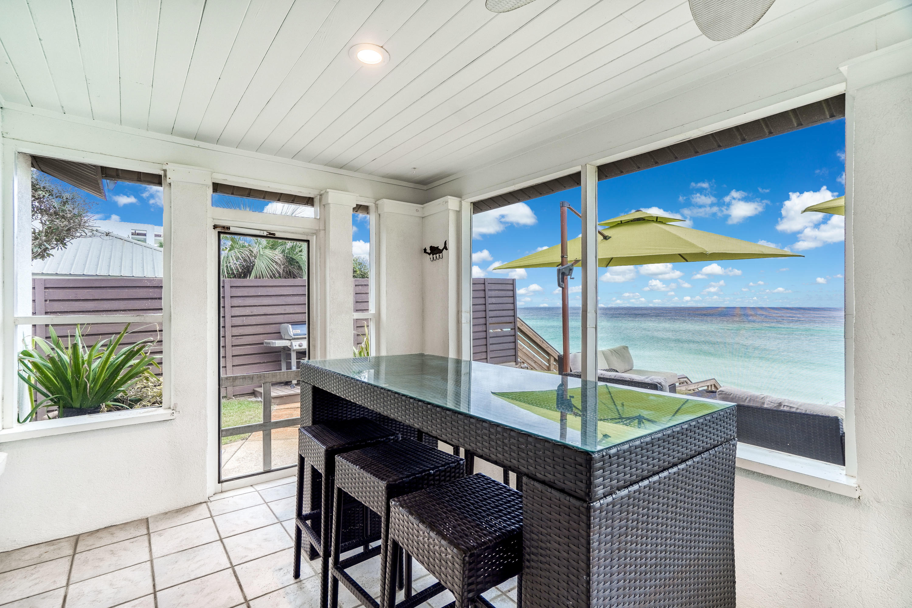 2912 East County Highway 30A Santa Rosa Beach, FL 32459 - Photo 24 of 43 a room with pool table and windows