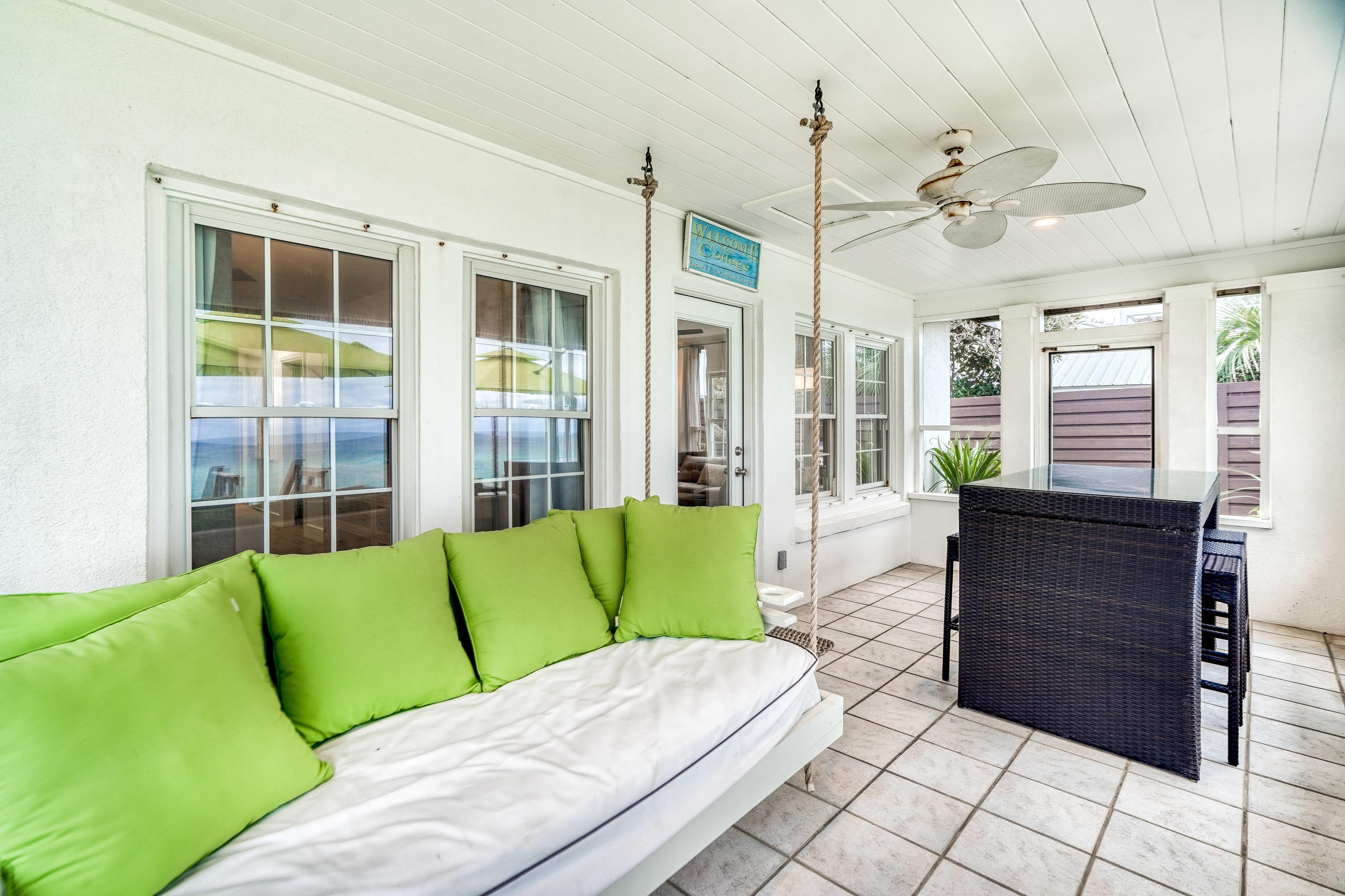 2912 East County Highway 30A Santa Rosa Beach, FL 32459 - Photo 25 of 43 a living room with furniture and a large window