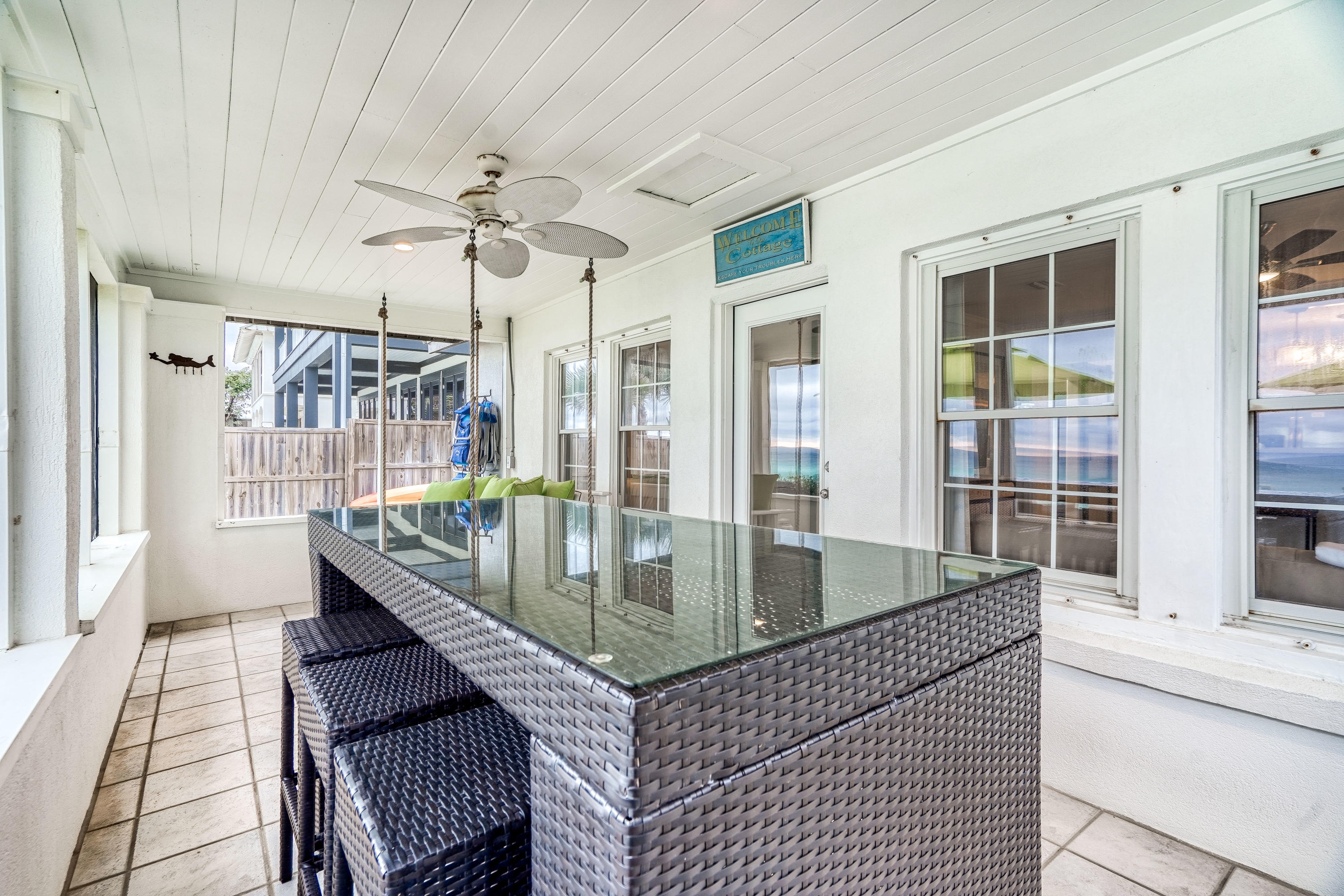 2912 East County Highway 30A Santa Rosa Beach, FL 32459 - Photo 27 of 43 a dining room with large window