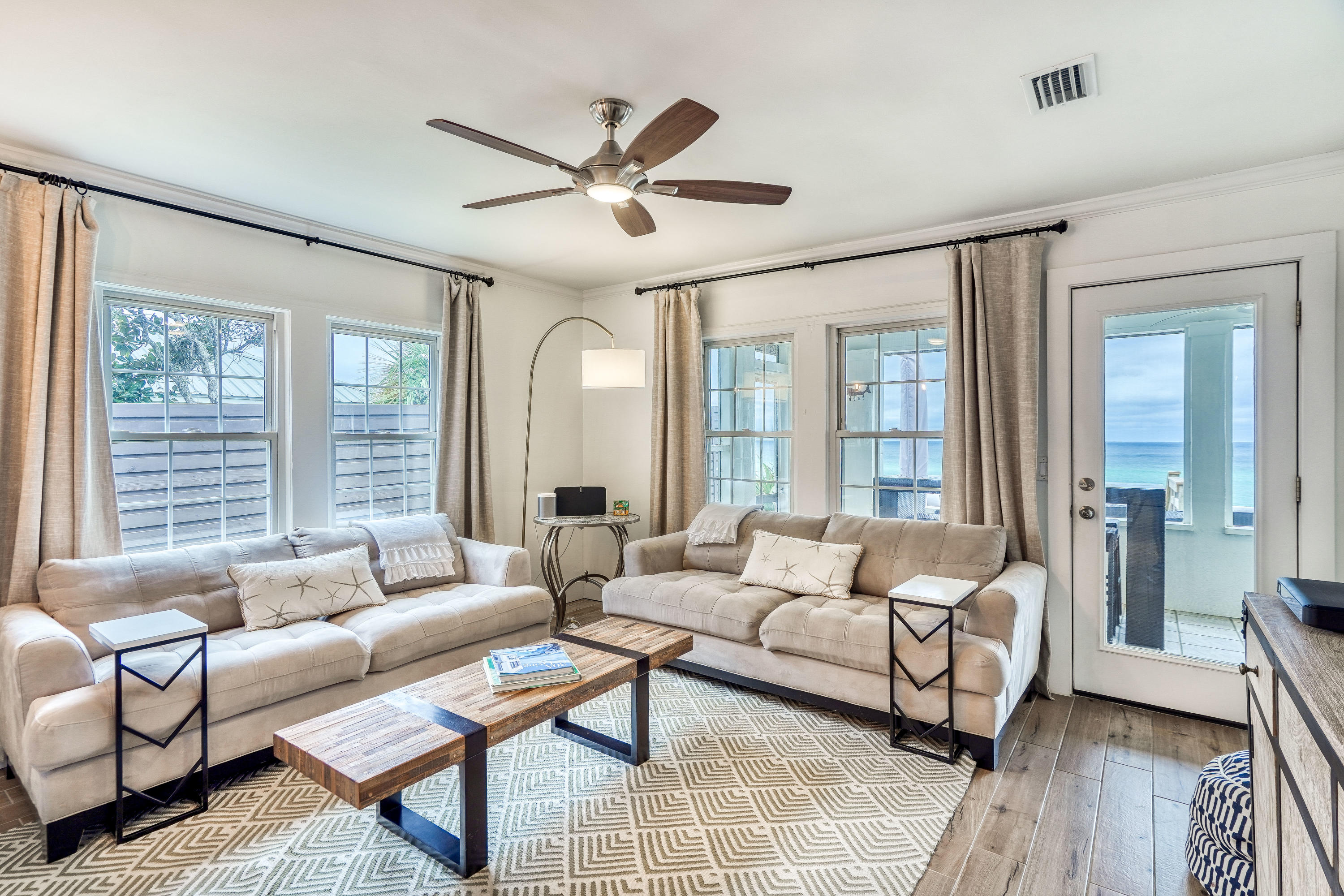 2912 East County Highway 30A Santa Rosa Beach, FL 32459 - Photo 3 of 43 a living room with furniture and a large window