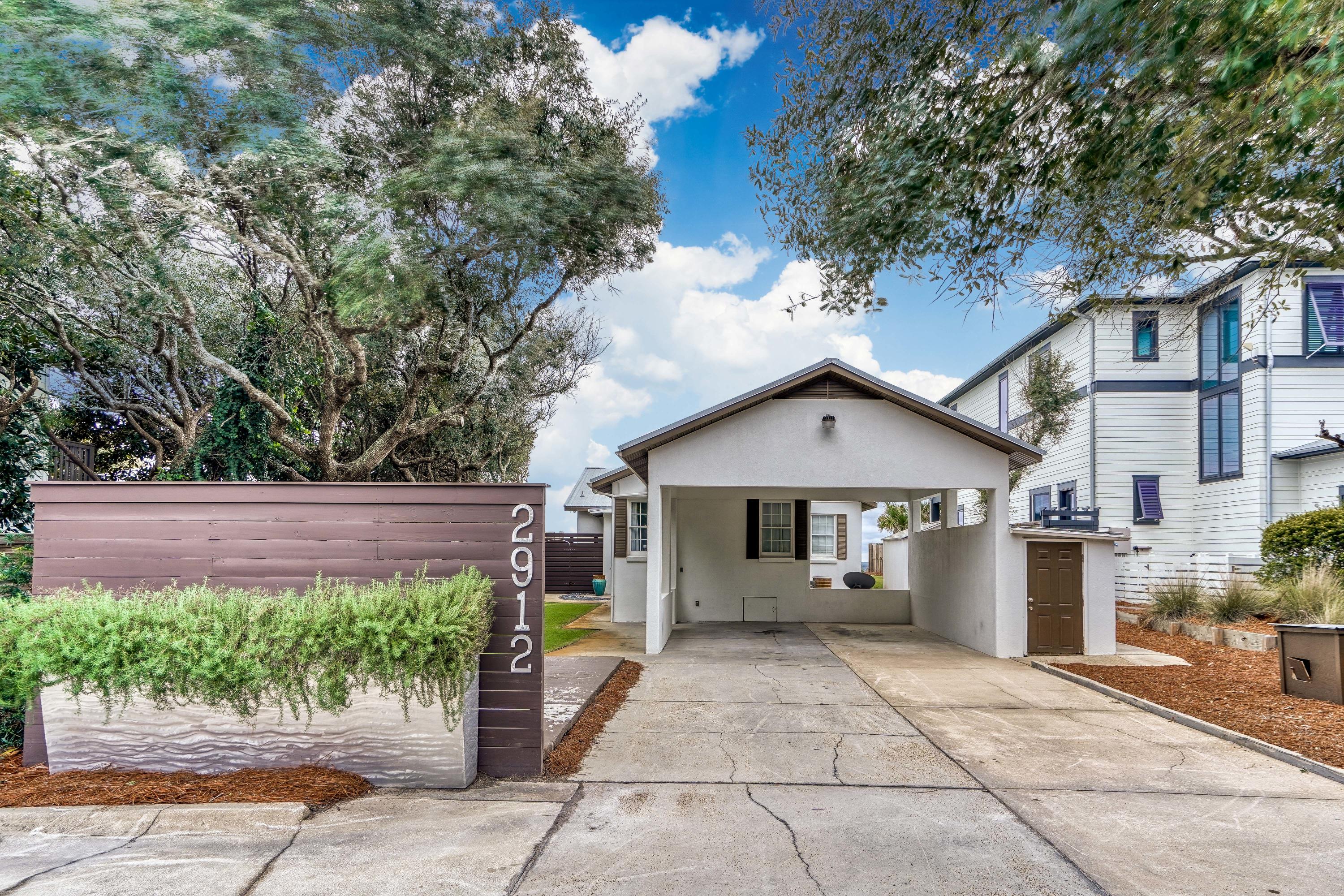 2912 East County Highway 30A Santa Rosa Beach, FL 32459 - Photo 36 of 43 a view of a house with a yard