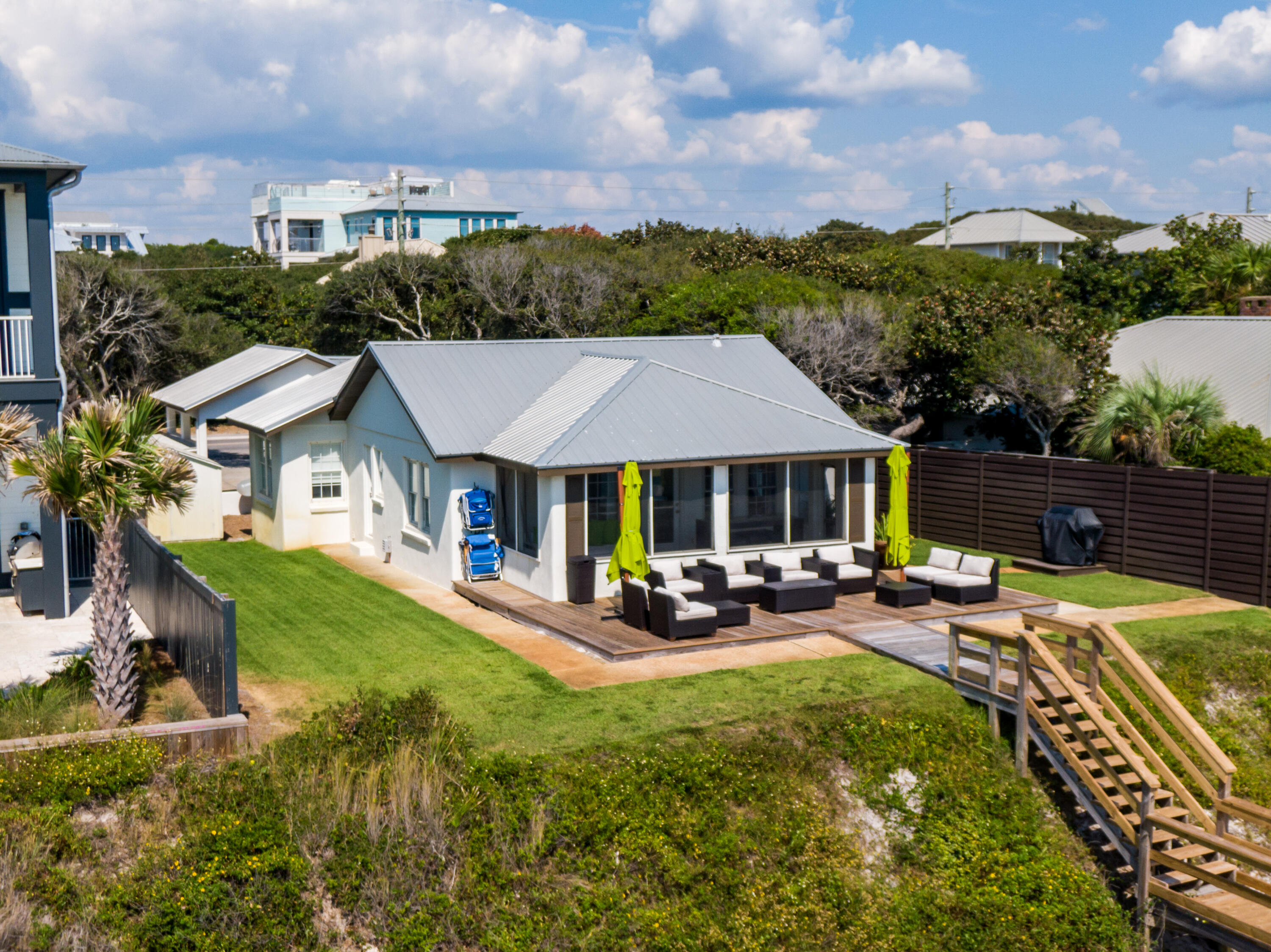 2912 East County Highway 30A Santa Rosa Beach, FL 32459 - Photo 39 of 43 an aerial view of a house with garden space and patio