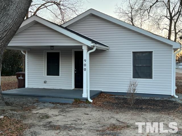 900 North Wilson Avenue Dunn, NC 28334 - Photo 1 of 12 a view of a house with a yard