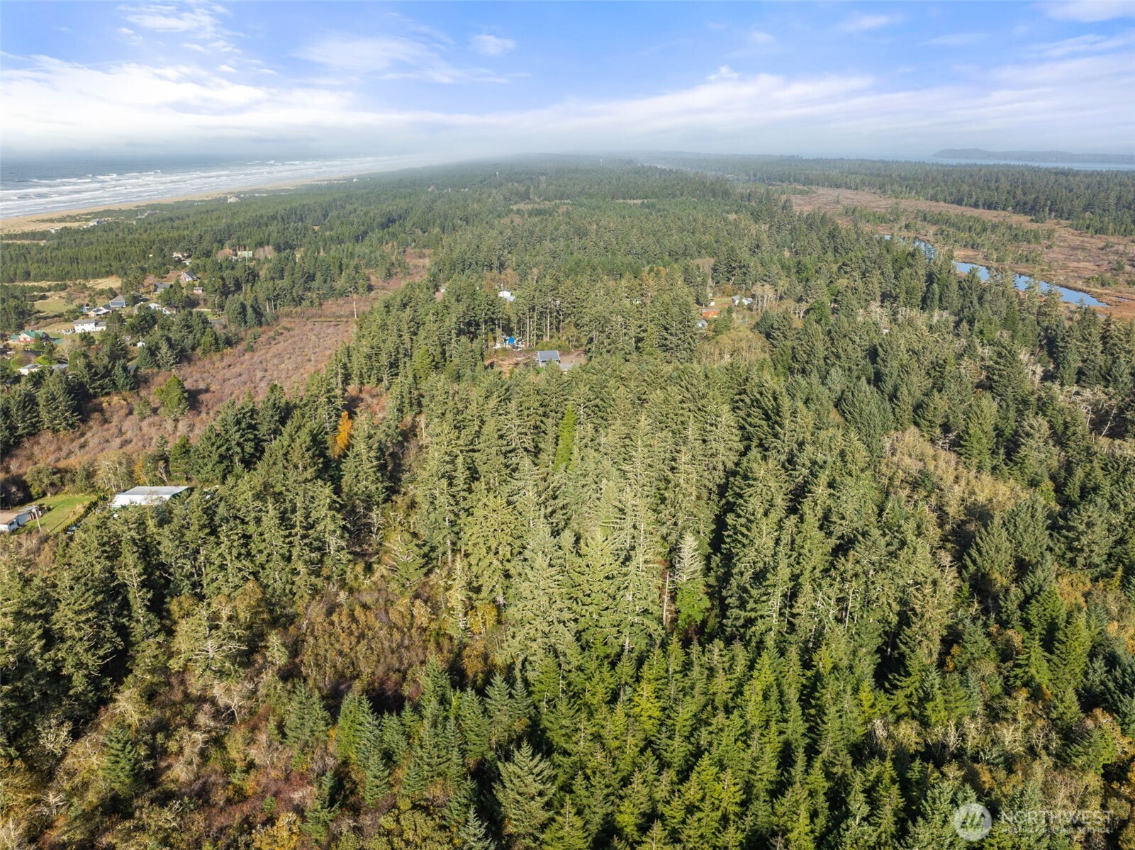 2 147th Place Long Beach, WA 98631 - Photo 8 of 9 a view of a green field with an ocean