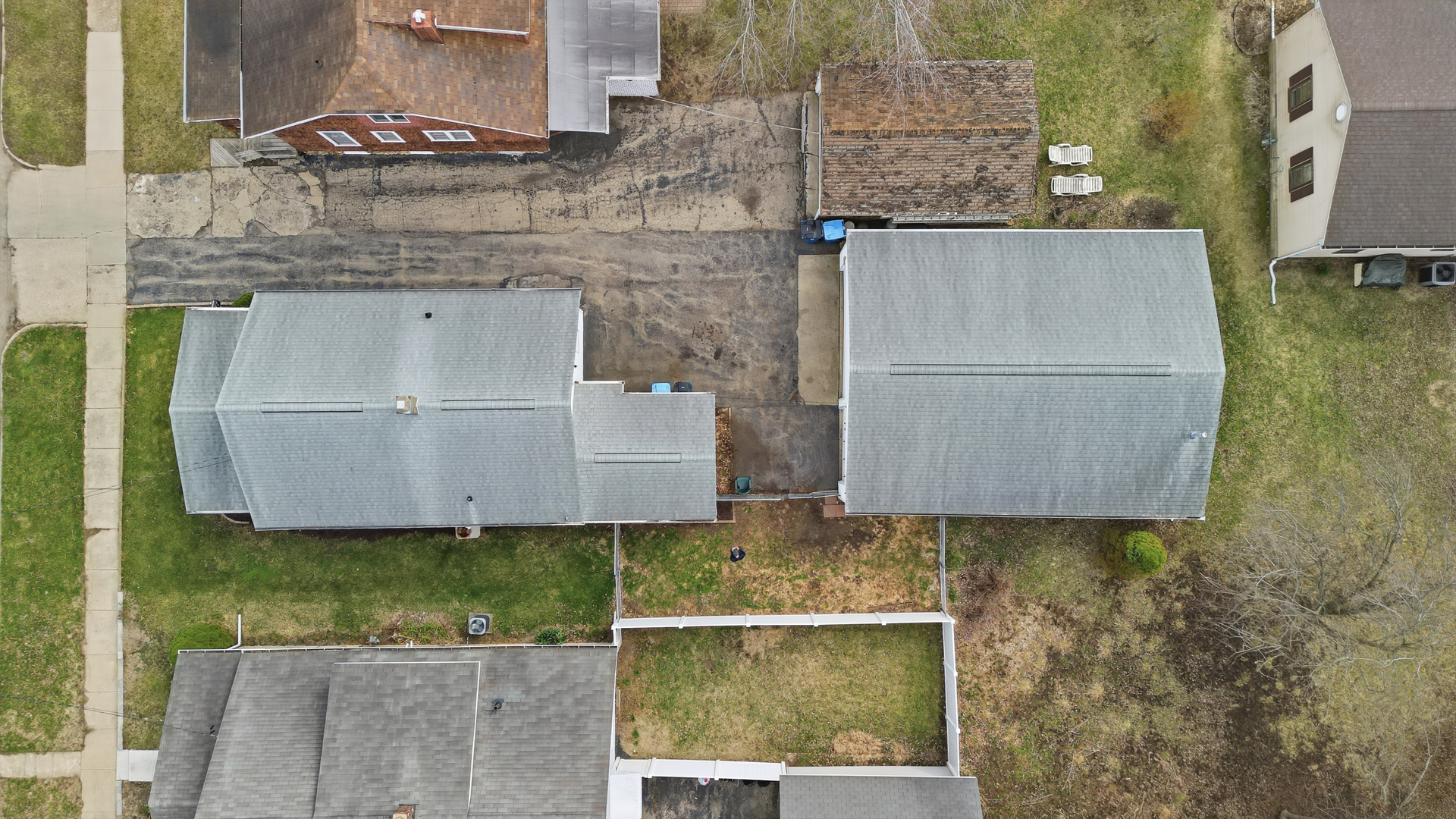 318 Spruce Street Dixon, IL 61021 - Photo 21 of 25 a aerial view of a house with large trees
